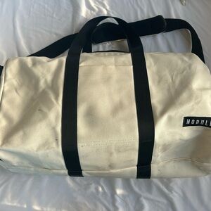 NOBULL waxed canvas duffle bag ivory white
